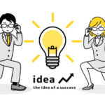 二人の会社員と電球